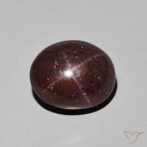 11.62ct طبيعي احمر غامق عقيق نجمى, بيضوي, غير شفاف