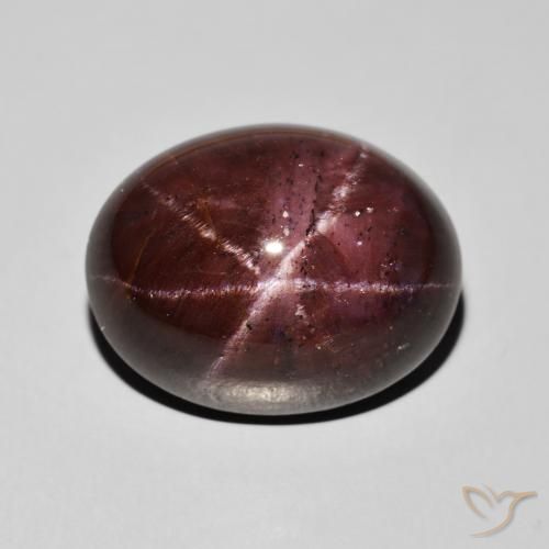 33.69ct طبيعي احمر غامق عقيق نجمى, بيضوي, غير شفاف