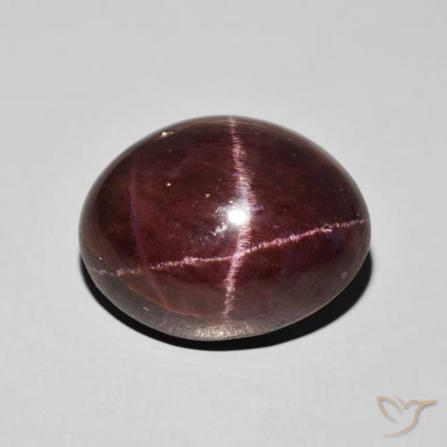 21.16ct طبيعي احمر غامق عقيق نجمى, بيضوي, غير شفاف
