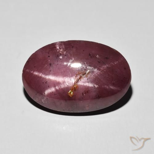 10.84ct طبيعي احمر غامق عقيق نجمى, بيضوي, غير شفاف