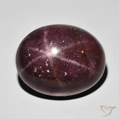 62.53ct طبيعي احمر غامق عقيق نجمى, بيضوي, غير شفاف