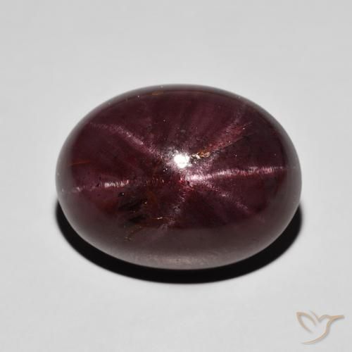 30.03ct طبيعي احمر غامق عقيق نجمى, بيضوي, غير شفاف