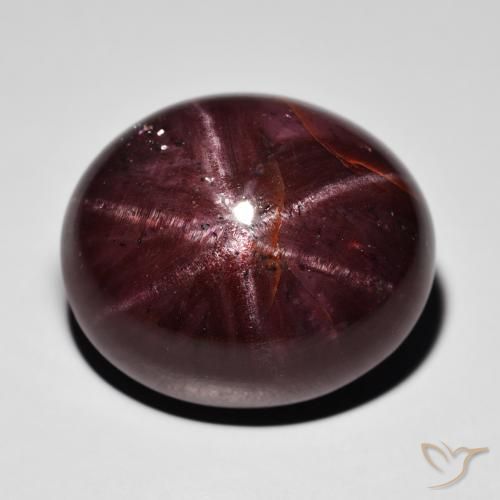 39.09ct طبيعي احمر غامق عقيق نجمى, بيضوي, غير شفاف