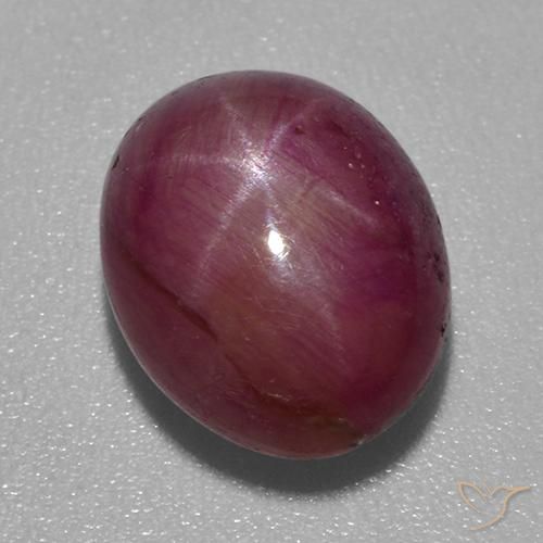 5.24ct طبيعي أرجواني محمر ياقوت نجمة, بيضوي, غير شفاف
