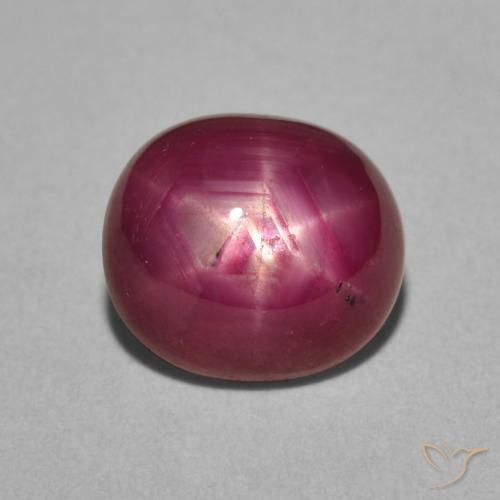 5.07ct طبيعي ماجنتى غامق ياقوت نجمة, بيضوي, غير شفاف