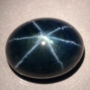 نجمة الياقوت أزرق طبيعي، قصة بيضاوى، 12.02 قيراط، نصف شفاف