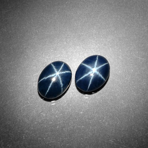 أحجار نجمة الياقوت أزرق طبيعية، قصة بيضاوى، غير شفاف، وزنها  قيراط