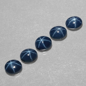 ياقوت أزرق نجمي طبيعي بلون أزرق، وزن ‎‎ قيراط، شكل بيضاوى، مقاس ‎5.2x4.2‎ مم