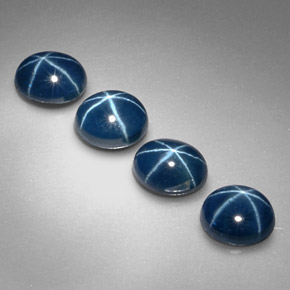 ياقوت أزرق نجمي طبيعي بلون أزرق، وزن ‎‎ قيراط، شكل بيضاوى، مقاس ‎5.2x4.1‎ مم