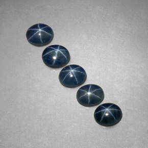 ياقوت أزرق نجمي طبيعي بلون أزرق، وزن ‎‎ قيراط، شكل بيضاوى، مقاس ‎5.2x4.3‎ مم