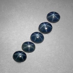 ياقوت أزرق نجمي طبيعي بلون أزرق، وزن ‎‎ قيراط، شكل بيضاوى، مقاس ‎5.2x4.3‎ مم