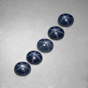 ياقوت أزرق نجمي طبيعي بلون أزرق، وزن ‎‎ قيراط، شكل بيضاوى، مقاس ‎5.2x4.3‎ مم