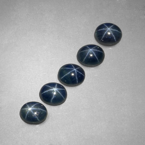 ياقوت أزرق نجمي طبيعي بلون أزرق، وزن ‎‎ قيراط، شكل بيضاوى، مقاس ‎5.2x4.3‎ مم