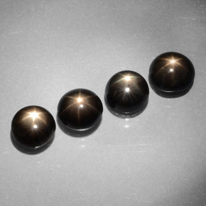 أحجار نجمة الياقوت أسود طبيعية، قصة دائرى، غير شفاف، وزنها  قيراط