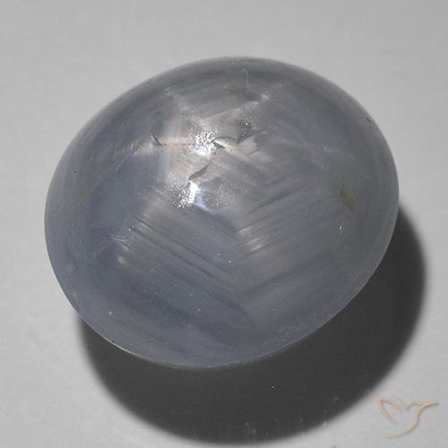 5.41ct طبيعي رمادى داكن نجمة الياقوت, بيضوي, نصف شفاف