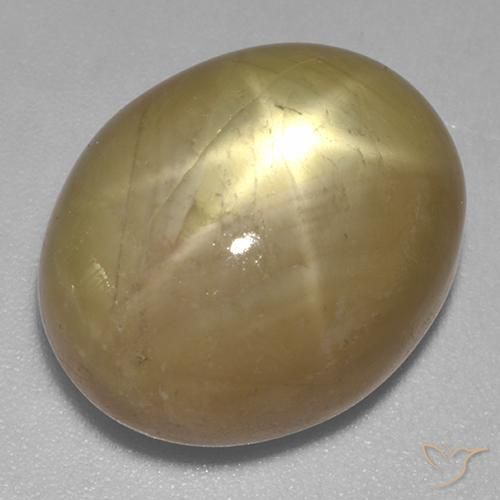 21.47ct طبيعي ذهبى برتقالى نجمة الياقوت, بيضوي, غير شفاف
