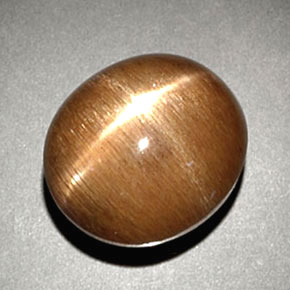 نجمة صن ستون بني ذهبي طبيعي، قصة بيضاوى، 6.93 قيراط، غير شفاف