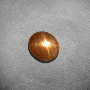 نجمة صن ستون بني ذهبي طبيعي، قصة بيضاوى، 1.55 قيراط، غير شفاف