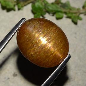 حجر الشمس نجمي بني ذهبي طبيعي، قصة بيضاوى، 8.81 قيراط، غير شفاف