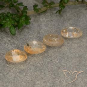 أحجار حجر الشمس برتقالى كنتالوبى طبيعية، قصة بيضاوى، نصف شفاف، وزنها 2.05 قيراط
