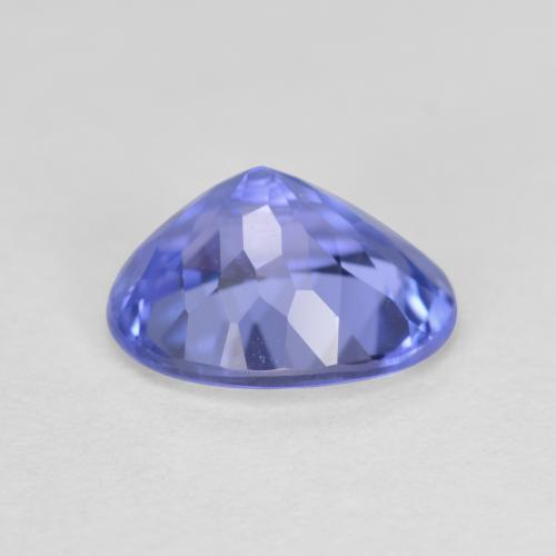 تنزانيت طبيعي بلون أزرق أرجوانى غامق، وزن ‎1.43‎ قيراط، شكل بيضاوى، مقاس ‎8x6.3‎ مم