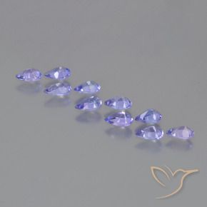 أحجار تنزانيت أزرق بنفسجى كثيف طبيعية، شكل الكمثرى، قليلا جدا، وزنها 1.80 قيراط