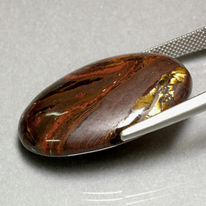 Tiger's Eye Matrix طبيعي بلون متعدد الألوان، وزن ‎35.49‎ قيراط، شكل بيضاوى، مقاس ‎29x18.6‎ مم