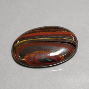 Tiger's Eye Matrix طبيعي بلون متعدد الألوان، وزن ‎45.58‎ قيراط، شكل بيضاوى، مقاس ‎30.9x21.6‎ مم