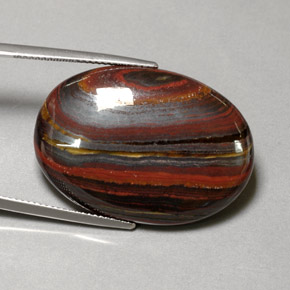 Tiger's Eye Matrix طبيعي بلون متعدد الألوان، وزن ‎45.58‎ قيراط، شكل بيضاوى، مقاس ‎30.9x21.6‎ مم
