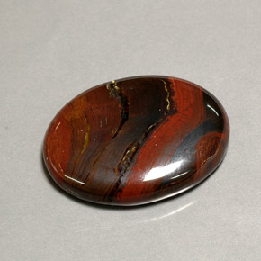 Tiger's Eye Matrix طبيعي بلون متعدد الألوان، وزن ‎41.60‎ قيراط، شكل بيضاوى، مقاس ‎28.7x22.7‎ مم