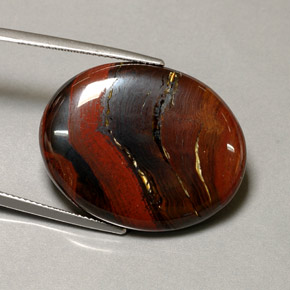 Tiger's Eye Matrix طبيعي بلون متعدد الألوان، وزن ‎41.60‎ قيراط، شكل بيضاوى، مقاس ‎28.7x22.7‎ مم