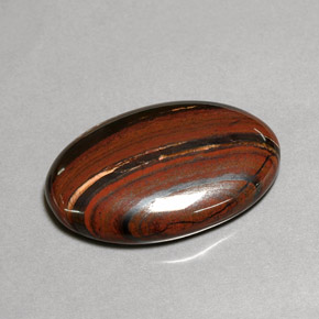 Tiger's Eye Matrix طبيعي بلون متعدد الألوان، وزن ‎35.01‎ قيراط، شكل بيضاوى، مقاس ‎29.9x20‎ مم