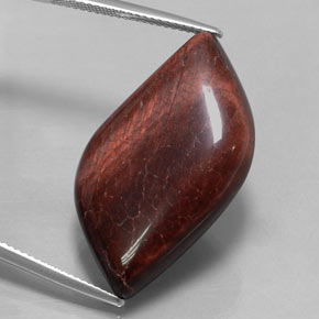 Tiger's Eye Matrix طبيعي بلون متعدد الألوان، وزن ‎28.57‎ قيراط، شكل شكل خيالي، مقاس ‎25.7x17.1‎ مم