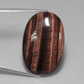 Tiger's Eye Matrix طبيعي بلون متعدد الألوان، وزن ‎42.21‎ قيراط، شكل بيضاوى، مقاس ‎34.3x22.7‎ مم