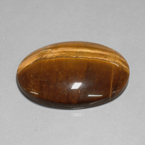 Tiger's Eye طبيعي بلون بني ذهبي، وزن ‎78.13‎ قيراط، شكل بيضاوى، مقاس ‎40x30.1‎ مم