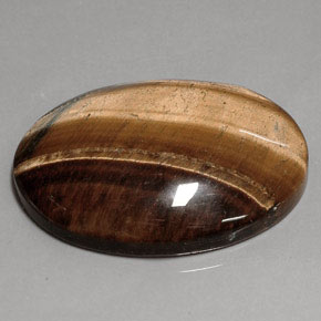 عين النمر ذهب البنى طبيعي، قصة بيضاوى، 75.54 قيراط، غير شفاف