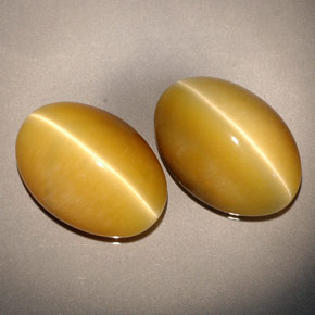 Tiger's Eye طبيعي بلون ذهبي، وزن ‎‎ قيراط، شكل بيضاوى، مقاس ‎13.8x9.8‎ مم