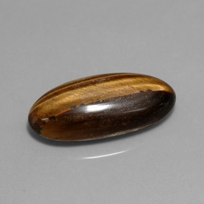 Tiger's Eye طبيعي بلون بني ذهبي، وزن ‎10.15‎ قيراط، شكل بيضاوى، مقاس ‎22.2x10.4‎ مم