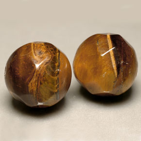 Tiger's Eye طبيعي بلون بني ذهبي، وزن ‎‎ قيراط، شكل كرة / كروي، مقاس ‎10.61‎ مم