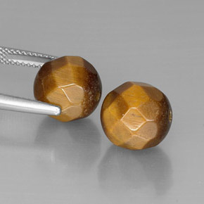 أحجار عين النمر ذهب البنى طبيعية، جسم كروى / الكرة، غير شفاف، وزنها  قيراط