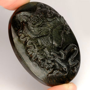 Tiger's Eye طبيعي بلون متعدد الألوان، وزن ‎122.90‎ قيراط، شكل شكل خيالي، مقاس ‎44x35.4‎ مم