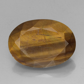 Tiger's Eye طبيعي بلون بني ذهبي، وزن ‎18.43‎ قيراط، شكل بيضاوى، مقاس ‎21.3x15.4‎ مم