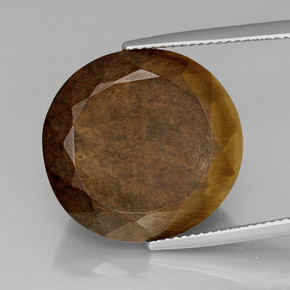 Tiger's Eye طبيعي بلون بني ذهبي، وزن ‎20.85‎ قيراط، شكل بيضاوى، مقاس ‎19.3x18.5‎ مم