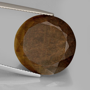 Tiger's Eye طبيعي بلون بني ذهبي، وزن ‎20.85‎ قيراط، شكل بيضاوى، مقاس ‎19.3x18.5‎ مم