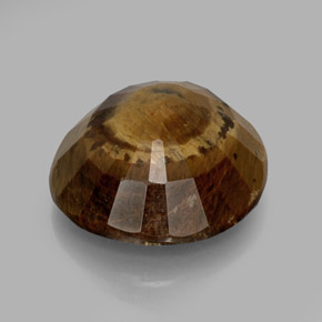 Tiger's Eye طبيعي بلون بني ذهبي، وزن ‎20.85‎ قيراط، شكل بيضاوى، مقاس ‎19.3x18.5‎ مم