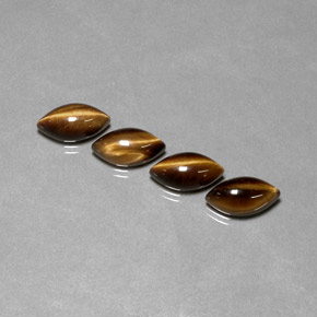 Tiger's Eye طبيعي بلون بني ذهبي، وزن ‎‎ قيراط، شكل ماركيز، مقاس ‎11.9x6.1‎ مم