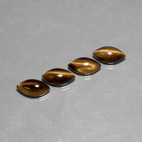Tiger's Eye طبيعي بلون بني ذهبي، وزن ‎‎ قيراط، شكل ماركيز، مقاس ‎11.9x6.1‎ مم