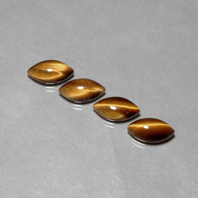 Tiger's Eye طبيعي بلون بني ذهبي، وزن ‎‎ قيراط، شكل ماركيز، مقاس ‎11.9x6.1‎ مم