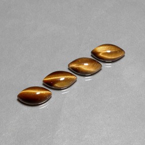 Tiger's Eye طبيعي بلون بني ذهبي، وزن ‎‎ قيراط، شكل ماركيز، مقاس ‎11.9x6.1‎ مم