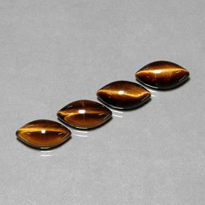 Tiger's Eye طبيعي بلون بني ذهبي، وزن ‎‎ قيراط، شكل ماركيز، مقاس ‎11.9x6.1‎ مم